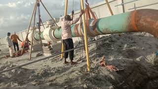 Underground pipeline tie-in joint during fit-up.