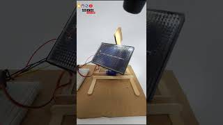 Demonstrating @Arduino solar tracker with a flashlight
