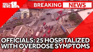 Officials: 25 hospitalized with overdose symptoms