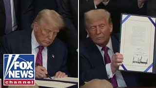 ‘THIS IS NOT AN AUTOPEN’: Trump swipes at Biden while signing crypto bill