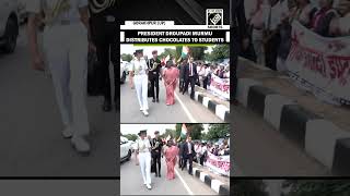 President Droupadi Murmu distributes chocolates to students in UP’s Gorakhpur