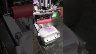 Labeling accuracy test of semi-automatic flat bottle labeling machine