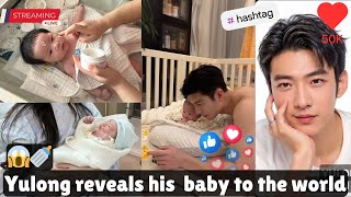 Yu Long Breaks Down in Tears as He Carries His Baby for the First Time