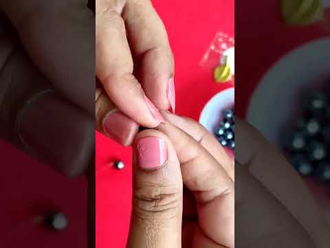 Beads bracelet with secure tie knot step by step. #beadsbracelets #beadstieknot#braceletes #motii#v