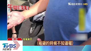徒手破車窗！男女路上爭執竟隨手砸車