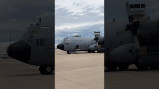 Loadmaster shuts door on C-130 ￼ Hercules aircraft during engine running crew change operation ￼
