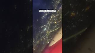 Flying Through a Sea of Lights ✨ | #NightView #airplane  #travelshorts #CityLights #asthetic