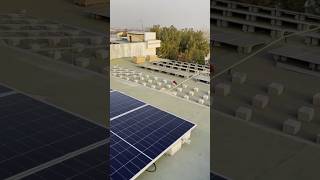 The installation process of a 1 MW solar project features a ballasted PV mounting system.