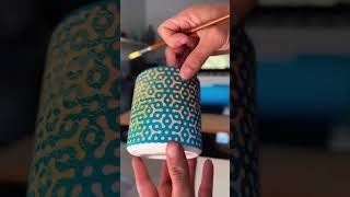 My start to finish process of stenciling and glazing a ceramic cup.