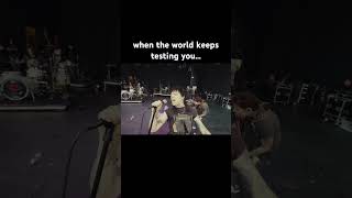 crazy fan runs on stage and fights band