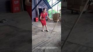 Precision art! Two wooden sticks are balanced in the air without falling.