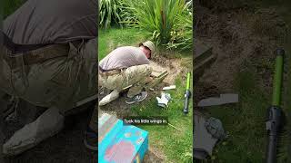 New Zealand Army: Soldiers help to tag a Blue Penguin