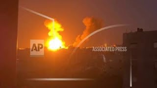 Explosions light up the night sky over Jabaliya, northern Gaza Strip