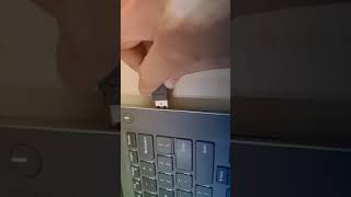 Plugging in modern laptop 4K creative common royalty free to use video