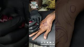 "Sacred Om Fusion: A Tribal Journey on Hitesh's Fist"