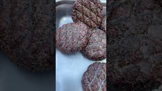 Smoked Brisket Burgers Basting under Oxtail Drippings at DESTINATION SMOKEHOUSE MURRIETA CALIFORNIA