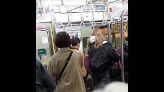 Keikyu line train arriving at Shinagawa station
