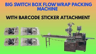 Big Switch box flow wrap packing machine with barcode sticker attachment.