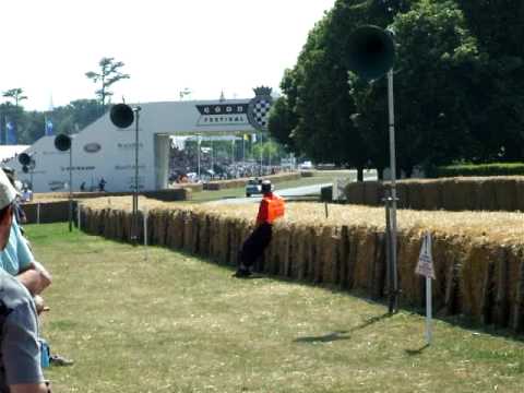 H1 FEV Mk1 Rally Escort going passed at Goodwood 2009