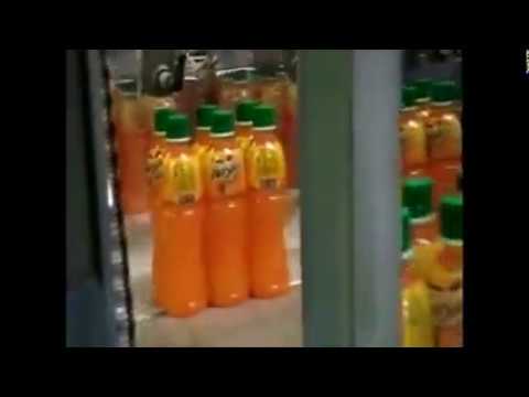 Bundling in Plastic Shrink Film followed by 500ml PET Bottles Tray Packing
