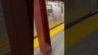 R46 #5608 Q train and R160A-2 #9694 R train leaving Herald Square