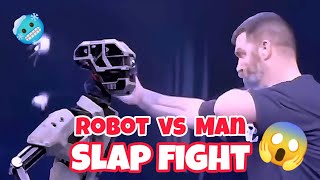 Robot vs man slap fight 😱