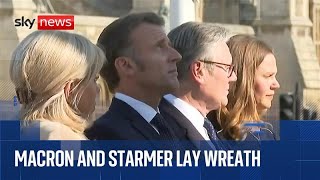 French President Emmanuel Macron lays a wreath at the statue of Sir Winston Churchill
