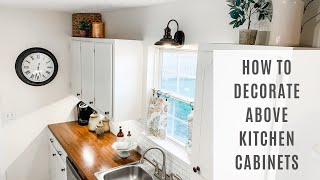 How to Decorate Above Your Kitchen Cabinets