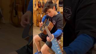 Our son got his first full sized guitar! @guitarcenter #acousticguitar #talentedkids #parentingwin