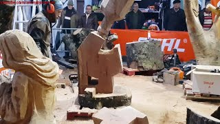 Chainsaw wood sculptures, roasted chestnuts, new red wine at Saint Martin's Magusto. Vila Real. 2018