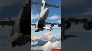"Incredible Aerial Precision! Fighter Jet Enters Transport Mid-Air 🚀✈"