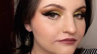 makeup, golden eye tint, eye shadow lashes and eyebrows