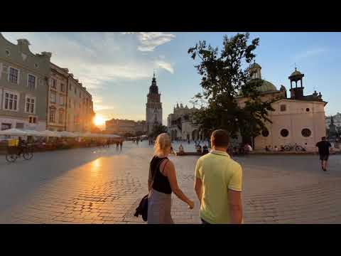 Tourists and City Residents Relaxing in Kraków's Iconic Historical City Centre