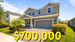 Tour a Homes By Westbay Avocet II Plan | 4528 Ballantrae Blvd, Land O Lakes