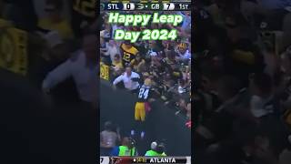 Quentin Rollins Celebrates Leap Day with a Lambeau Leap After Pick-6