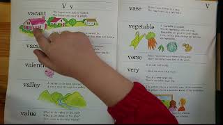 6 year old boy's reading English sentences. Going through words  which start with "U" and "V"