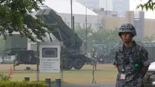 Pence examines anti-missile system deployed in Tokyo