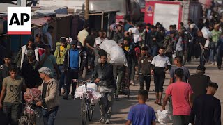 Palestinians return to Khan Younis after deaths at aid collection hub in Gaza