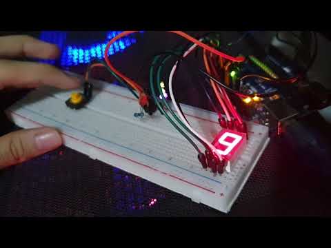 Arduino 7 segment - 0 to 9 then count stop when switch is pressed