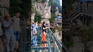Massive Rock Falls Next to Tourists on Glass Bridge!