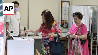 Taiwan votes to decide whether to oust lawmakers from China-friendly party
