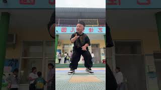 Brother Kid" and park NPC dance with synchronized moves and expressive faces.