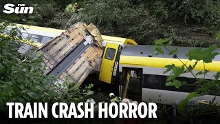 At least three killed after train derails & overturns with passengers left trapped in Germany