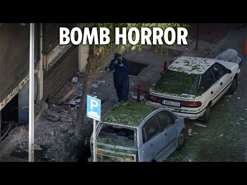 Woman dies after bomb explodes in HANDS as cops probe plot to blow up bank
