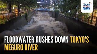 Floodwater gushes down Tokyo's Meguro River | GMA Integrated News