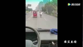Angry Chinese Guy Uses Kungfu On Moving Car