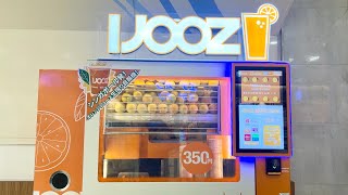 オレンジジュース生搾り自販機　たい焼き屋