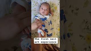 The first reaction of nail art for my baby #baby #babynails #babysleep #parentinglife #babyshorts
