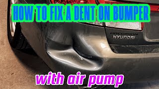 Bumper dent repair with air pump / ball