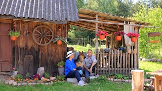 Cooking fish on a wood stove. Cellar renovation, bird feeder. Family life in the village